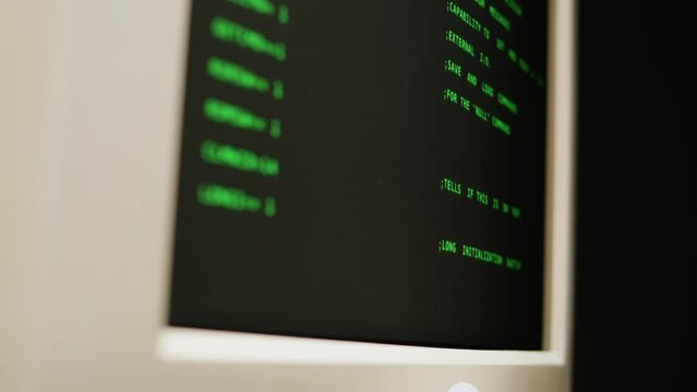 Retro pc with loading code console, programmer making scripts, green basic screen, Old computer studio close-up, Desktop vintage retro wave display, late 90s PC.