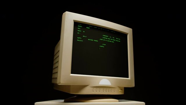 Retro pc with loading code console, programmer making scripts, green basic screen, Old computer studio close-up, Desktop vintage retro wave display, late 90s PC.