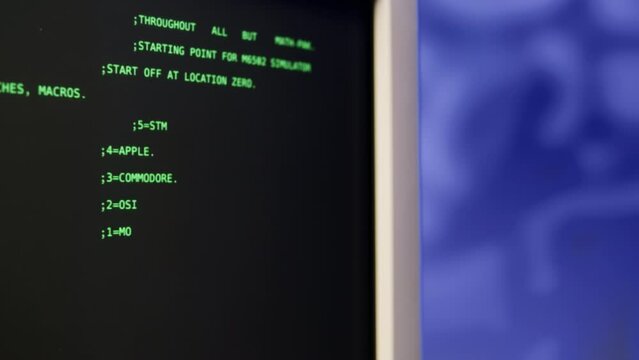 Retro pc with loading code console, programmer making scripts, green basic screen, Old computer studio blue night background close-up, Desktop vintage retro wave display, late 90s PC.