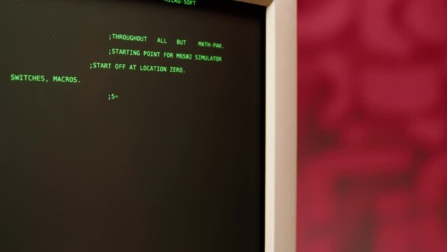 Retro pc with loading code console, programmer making scripts, green basic screen, Old computer studio close-up, Desktop vintage retro wave display, late 90s PC.