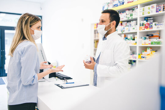 Pharmacy worker and customer stock photo
Customer buying some pharmacy products