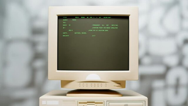Retro pc with loading code console, programmer making scripts, green basic screen, Old computer studio close-up, Desktop vintage retro wave display, late 90s PC.