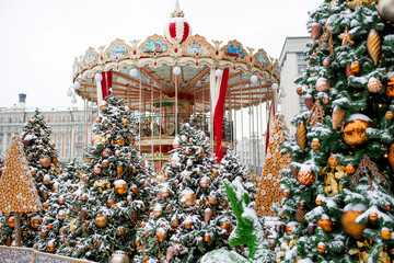 Christmas decoration of the streets. Beautiful festive landscapes in the city. Decorated Christmas trees. New Year's Winter holidays 2023