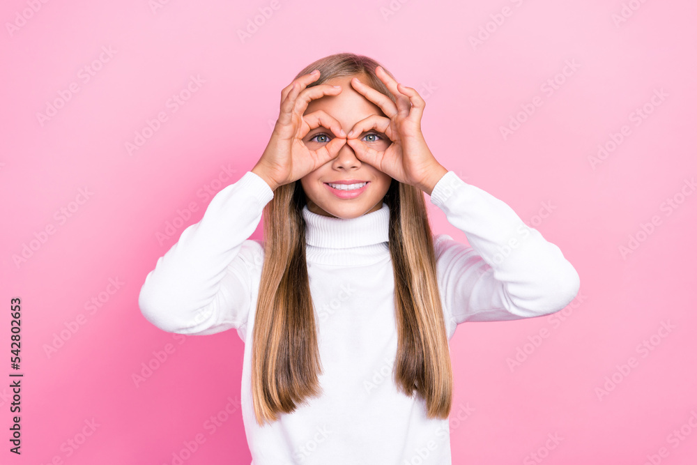 Sticker Portrait of attractive cheerful girl wear white outfit arm demonstrate imaginary eyewear good mood isolated on pink color background