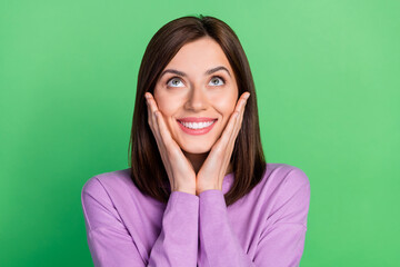 Obraz premium Closeup photo of young attractive office manager dreaming about holidays hands cheeks isolated on green color background