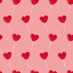 Seamless pattern with bright red heart-shaped lollipops