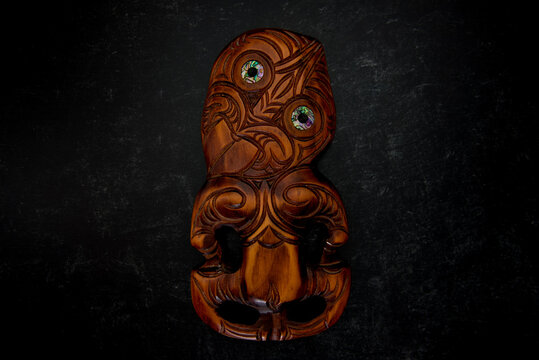 Wooden Maori Hei Tiki Hand Carved With Paua Shell Eyes. New Zealand Taonga.