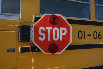 red stop sign in traffic