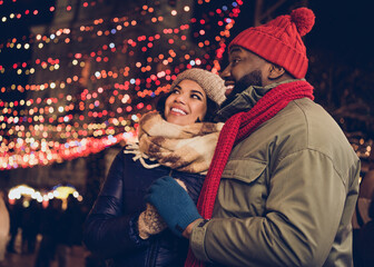 Portrait of attractive cheerful people friends friendship wearing warm outfit visiting fair romance evening day time strolling city urban outdoors