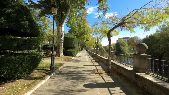Pov walking in Burgos city park el Espolon, Castile and Leon, Spain. High quality 4k footage