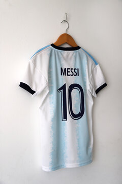 Argentina soccer jersey. Lionel Messi shirt. Number 10. light blue and white. AFA logo. Argentine Football Association. Adidas. Shield. Soccer player.