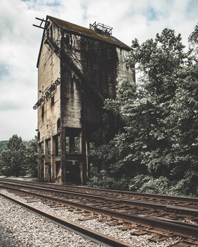 Vertical shot of a broken old building in the abandoned town of Thurmond, West Virginia