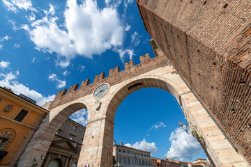 The Portoni della Bra, the historic two arched gateways entering the Piazza Bra, site of the ancient Roman Arena, in Verona, Italy.