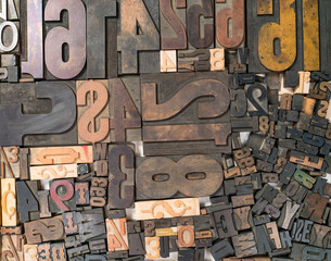Antique vintage letterpress wooden and metal type blocks background