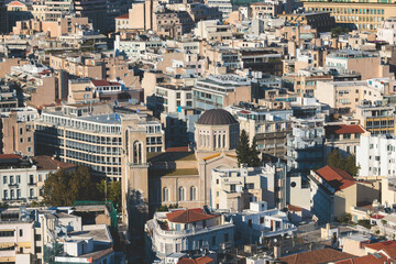 Fototapeta premium Athens, Attica, beautiful super-wide angle view of Athens city, Greece, Mount Lycabettus, mountains and scenery beyond the city, seen from The Parthenon, temple on the Athenian Acropolis