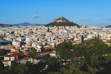 Fototapeta na wymiar Athens, Attica, beautiful super-wide angle view of Athens city, Greece, Mount Lycabettus, mountains and scenery beyond the city, seen from The Parthenon, temple on the Athenian Acropolis
