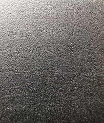 Black table wood texture with macro lens. Micro pores and imperfections