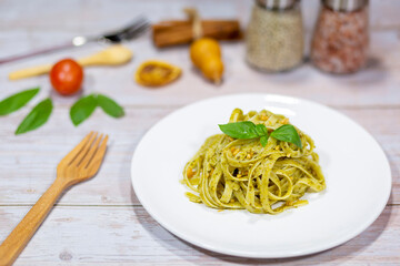 Today's dinner is fettuccine with pesto sauce. healthy menu