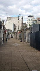 Poster Alley lined with crypts in La Recoleta Cemetery in Buenos Aires, Argentina © Angela
