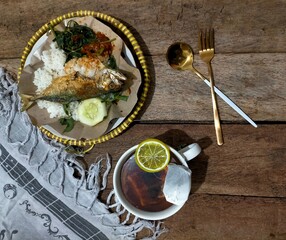 grilled salmon with rice on the table 