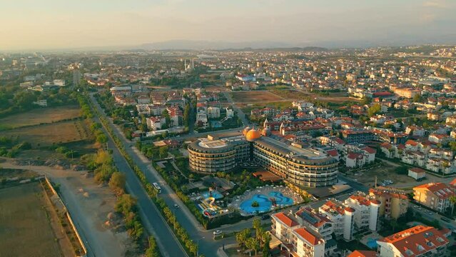 ascending view of the beautiful city, hotels, and pools. Okurcalar, Turkey. High quality 4k footage