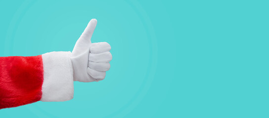 santa claus hand with thumb up, giving a like