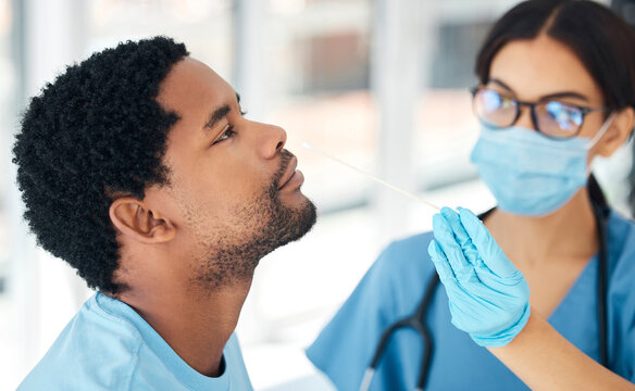 Healthcare, Hand And Covid Test By Doctor With Man In Hospital For Diagnosis, Compliance And Health Check. Medical, Research And Corona Testing By Nurse And Patient Nose, Sample And Consultation Room