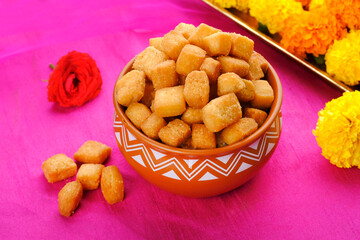 Shakkar pare / Shakkarpare / shankar pale is a sweet tea time snack food from India, Traditional homemade indian maharashtrian Diwali Festival sweet snack food.