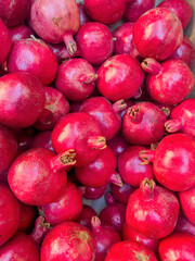 Group of pomegranates. Pomegranate closeup, background.