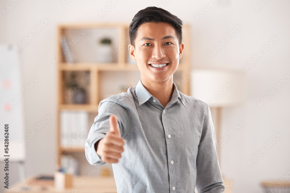 Poster Thumbs up, success and portrait of Asian businessman standing in office, smile on face and confident. Good work, happy and successful man in marketing, design and creative workspace with hand gesture