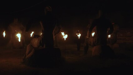 Shot of evil sorceress preparing for making rituals at night, using black witchcraft. Halloween concept.