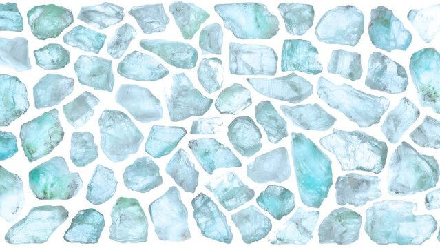 Apatite stones set texture on white isolated background. Moving right seamless loop backdrop.