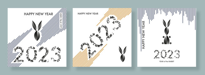 Obraz na płótnie Canvas Creative concept of 2023 Happy New Year posters set. Modern design with typography 2023 in the form of rabbit for celebration and season decoration.Template for branding, banner, card. Year of Rabbit