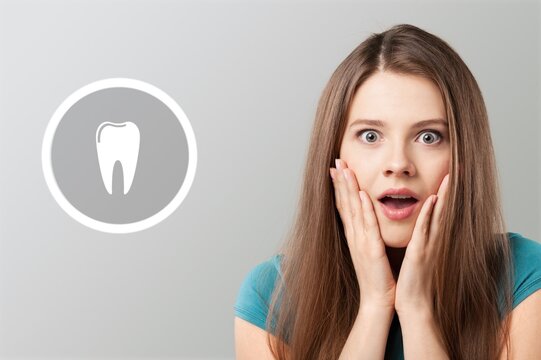 Young happy woman and teeth image on background