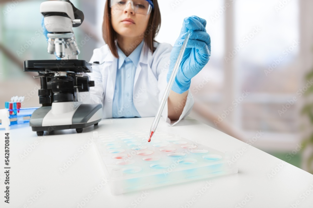 Poster scientist person working with microscope in laboratory.