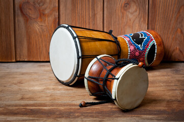 Damaru and djembe drums, percussion and musical instruments.