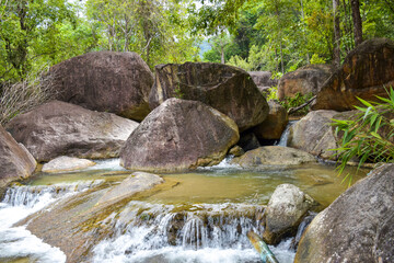 Naklejka na ściany i meble waterfal beauty nature and rock stone in south Thailand