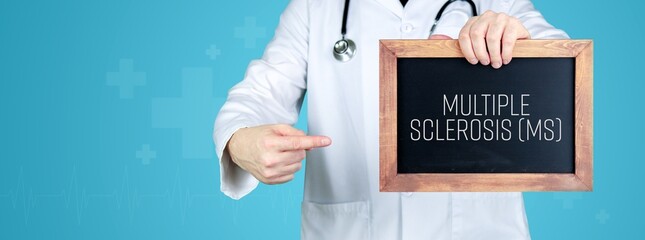 Multiple sclerosis (MS). Doctor shows medical term on a sign/board