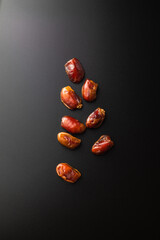 Dates fruit on dark background with copy spaces. Arabian fruit