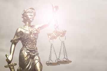 Law and justice concept. Mallet gavel of the judge, scales of justice, books. Copy space for text