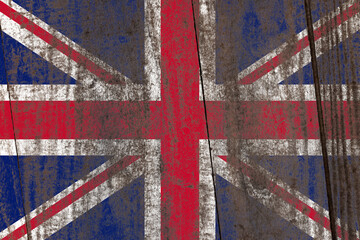 Fototapeta premium United kingdom flag painted on a damaged old wooden background