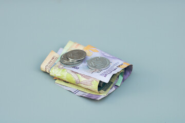 collection of Indonesian state money and coins, with gray copy space or negative space, Indonesian rupiah
