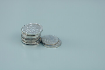 collection of Indonesian state coins, with gray copy space or negative space, Indonesian rupiah