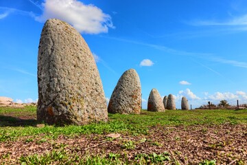 Menhir stones from the bronze age at Archeological site of Tamuli. Macomer, Sardinia, Italy