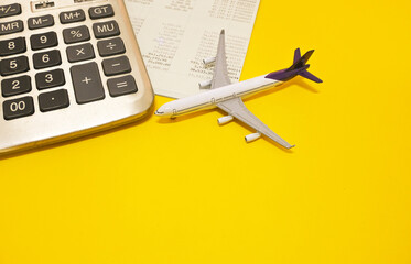 calculator and account book airplane