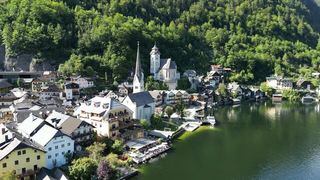 Hallstatt Austria beautiful lakeside village close up waterfront drone aerial view