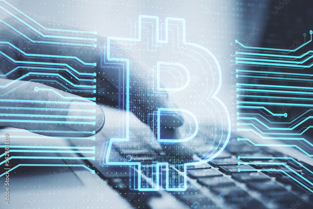 Poster Close up of hand using laptop keyboard with creative bitcoin hologram on blurry background. Cryptocurrency and blockchain concept. Double exposure.