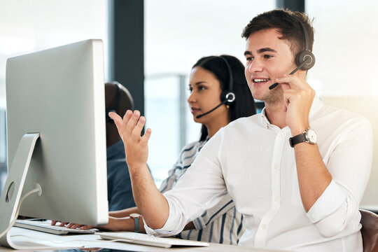 Computer Customer Support And Crm Man Employee On An Office Phone Consultation. Speaking Internet And Web Call Center Employee Consultant With Headset Working On Tech Consulting And Telemarketing