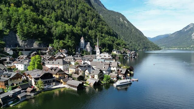 Hallstatt Austria beautiful lakeside village panning Point of view drone aerial