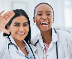 Nurse, doctor and selfie of women happy in a hospital and wellness health clinic with a smile,...